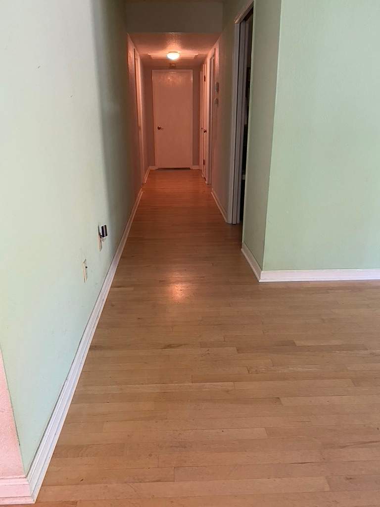Former Gym Floors Refinished in Newcastle Residential Home by Footprints Floors South Sacramento