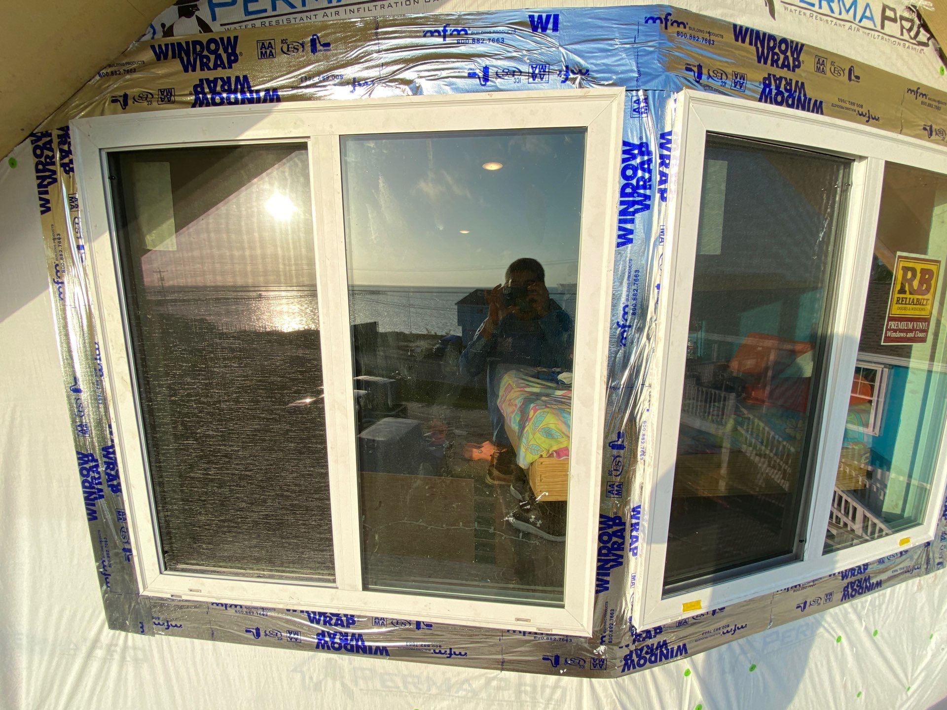 Installing Windows on a Submarine  by Bayfront Roofing and Construction