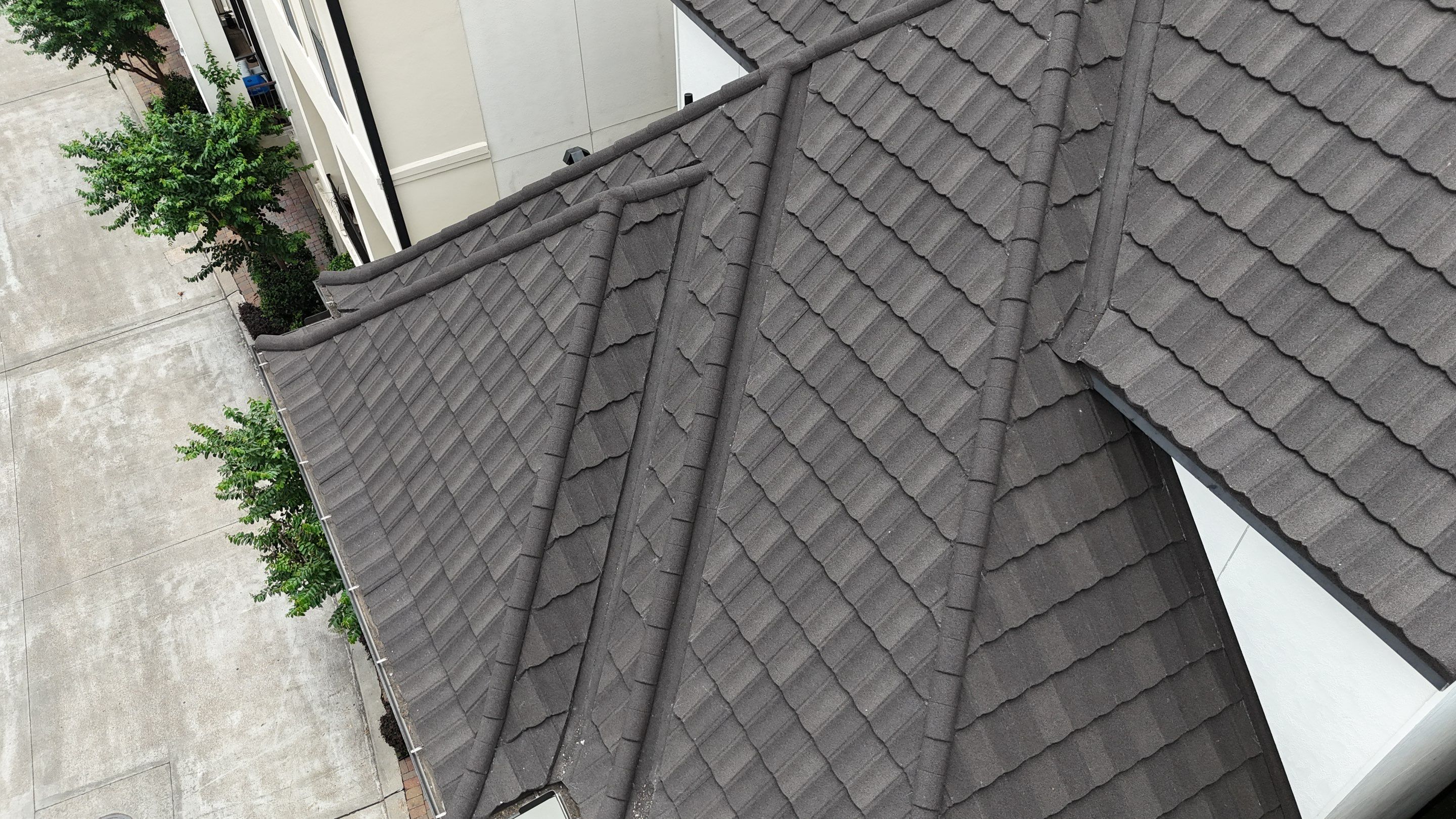 Stunning transformation from Shingles to DECRA Tile by Core Four Roofing