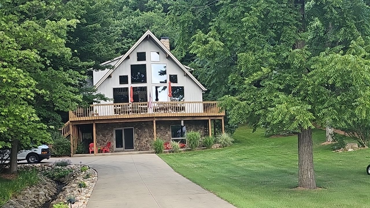 Owens Corning Color: Williamsburg Gray by Eagle Eye Roofing