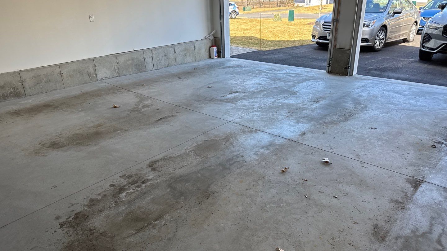 Garage in Londonderry, NH 03053 by Symphony Concrete Coatings