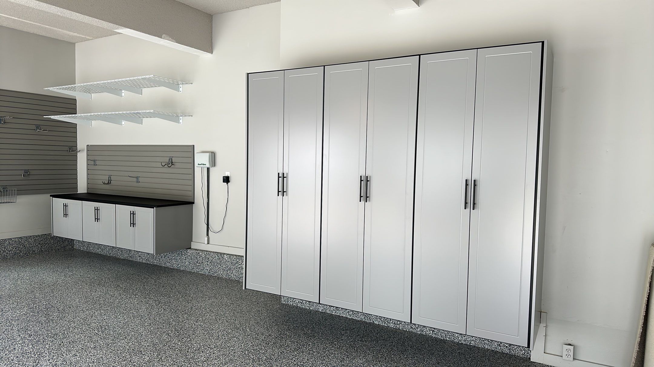 Julie H. upgraded her garage with our cabinets and wall storage options  by Banner Garage