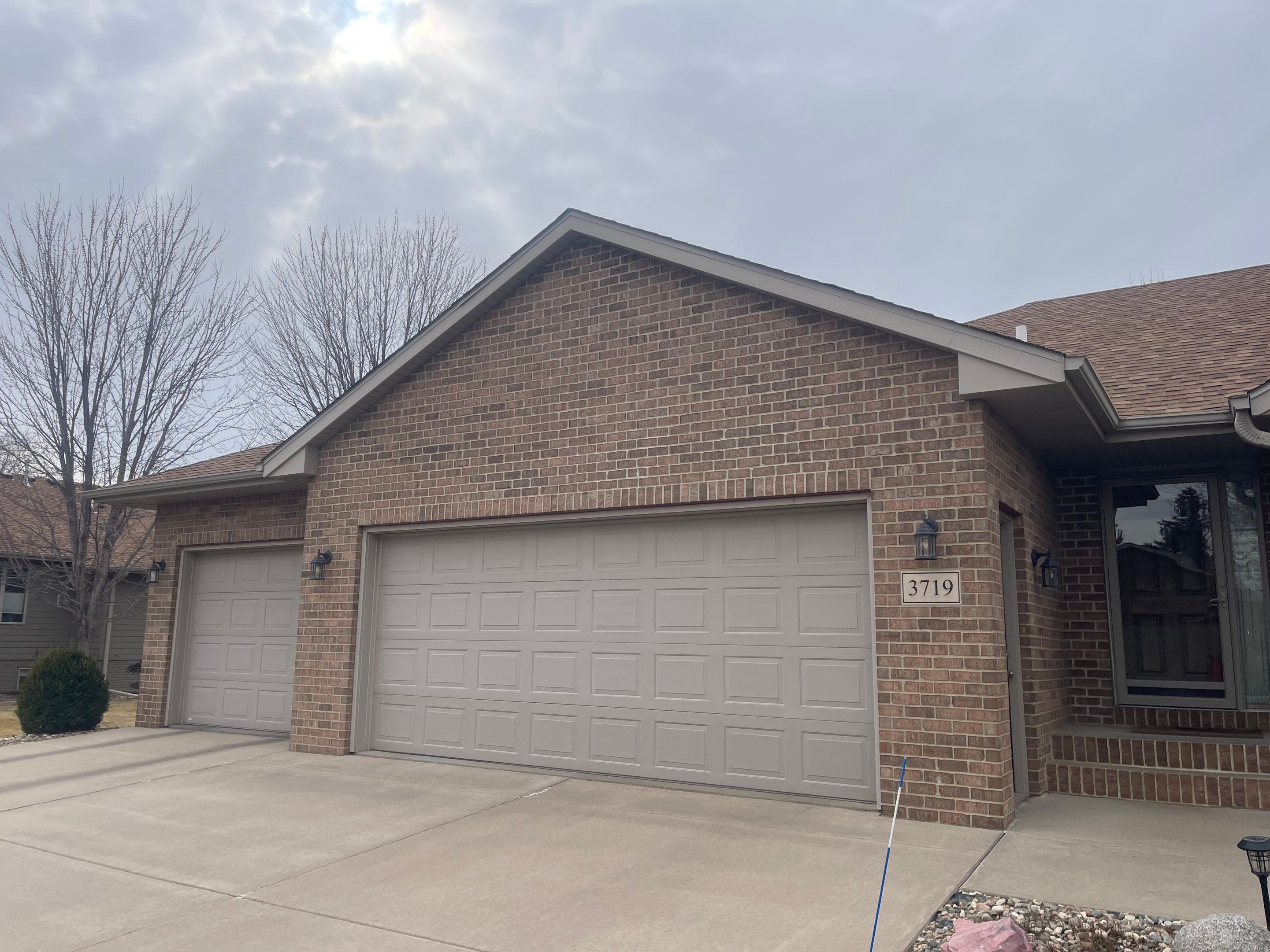 Residential Exterior Siding and Trim Painting in Sioux Falls by Select Painting, Coatings & Garage Cabinets