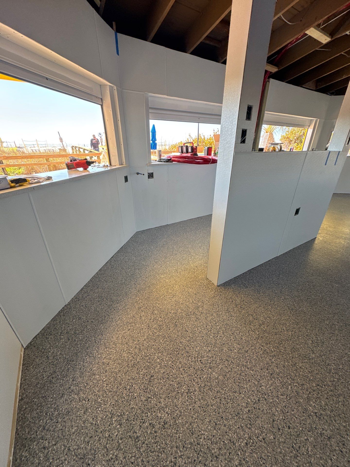 Commercial Restroom Refresh: Seamless 'Tidal Wave' Flake for a Repeat Client by Performance Floors & Coating
