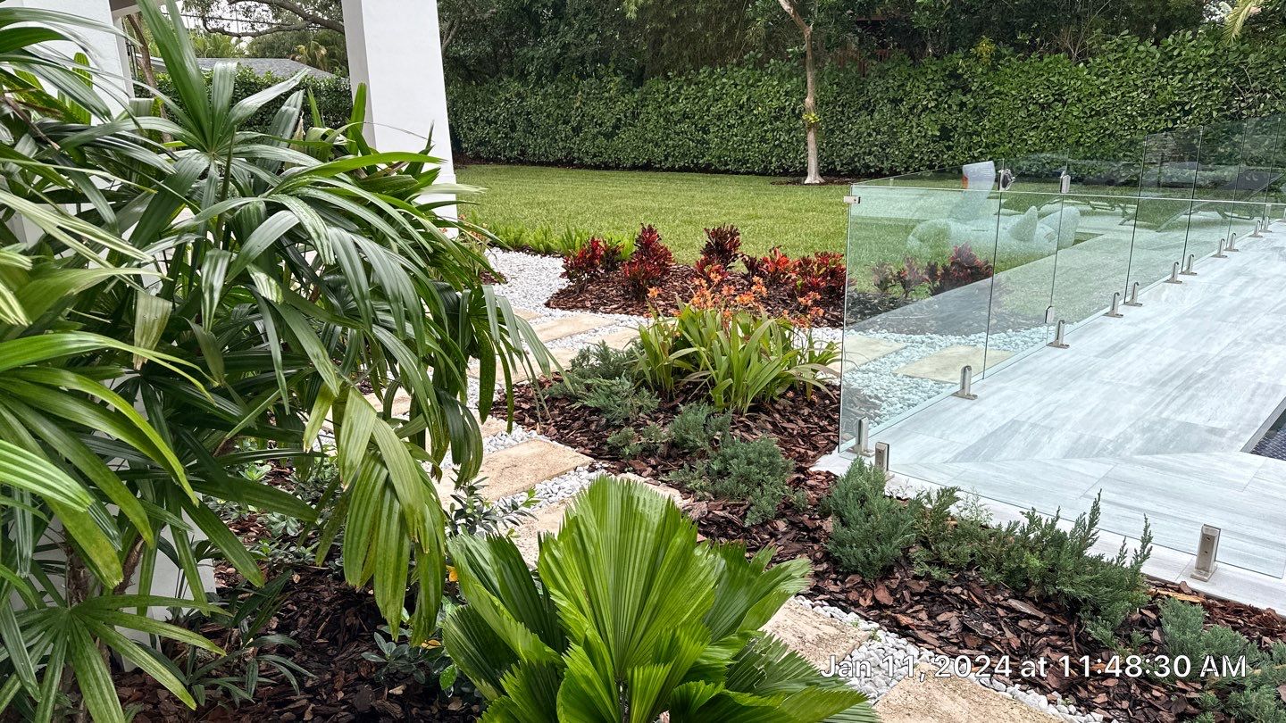 Backyard Landscape Renovation by Nature's Dream Landscape and Tree Service