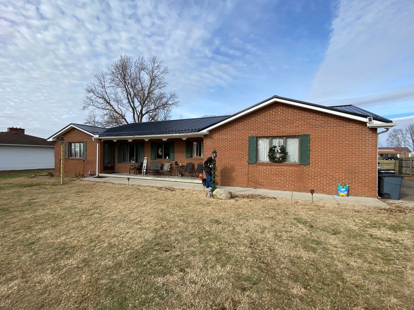 Residential Roofing Installation using Perfromance Panel Metal - Black by RoofX 