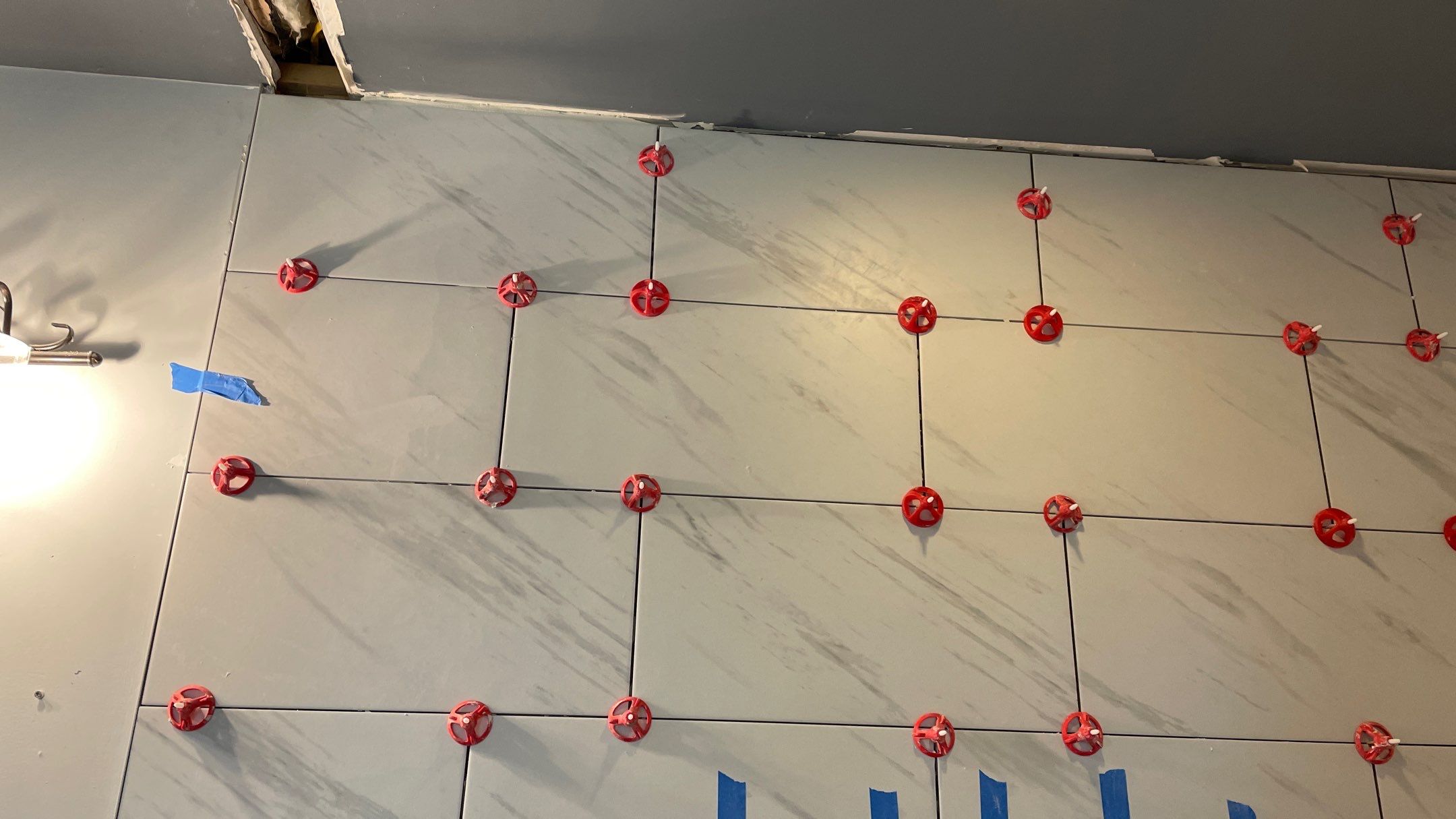 Bright Bathroom Remodel with Wall Removal, Stand Alone Tub and New Vanity by Footprints Floors of Coastal Carolina