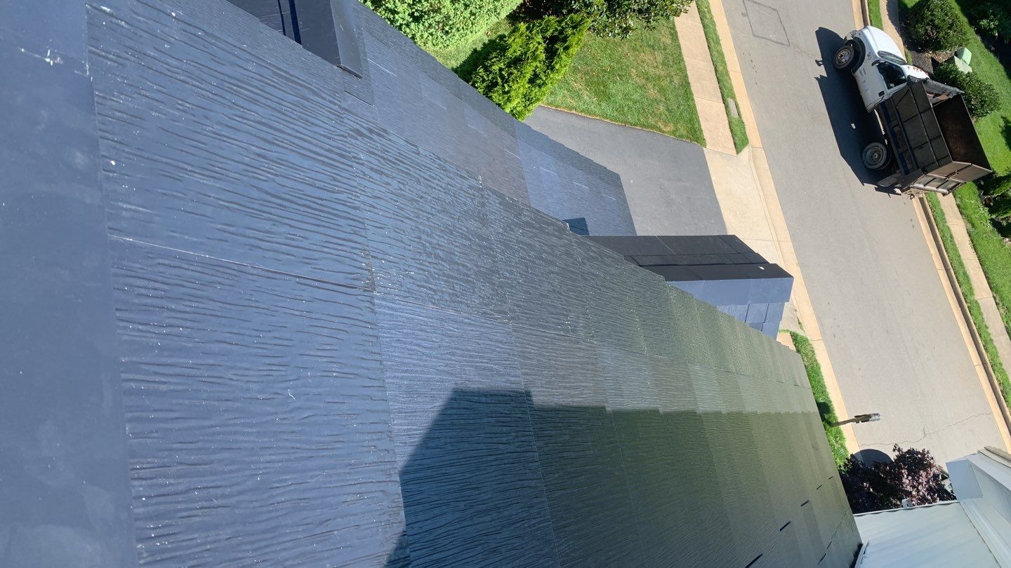 Tesla Solar Roof Replacement using Tesla Solar Roof V3 tiles by American Home Contractors