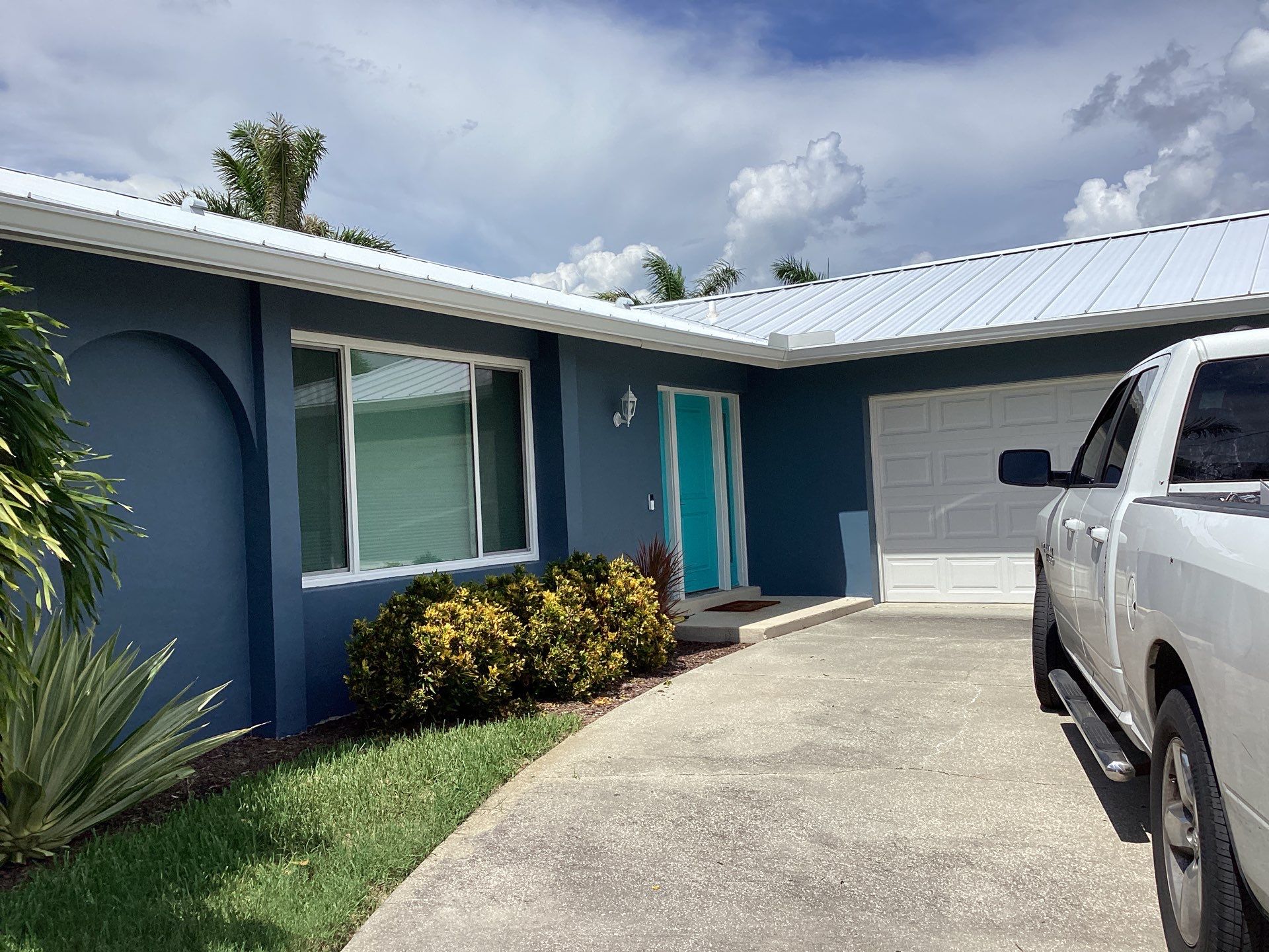 White Downspouts and Gutters Combo in Punta Gorda FL by Gutter Professors