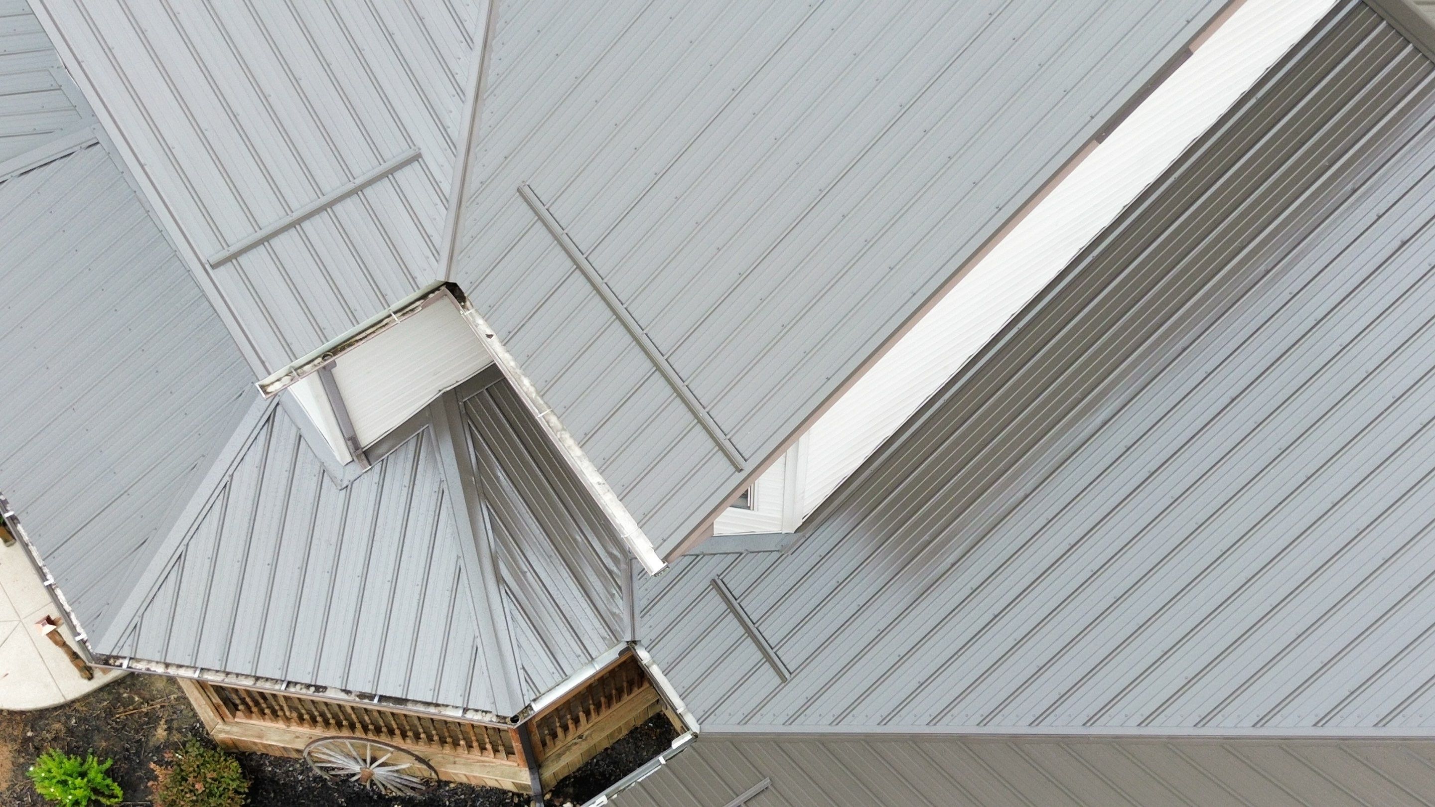 Residential Roofing Installation using Performance Panel Metal - Burnished Slate by RoofX 