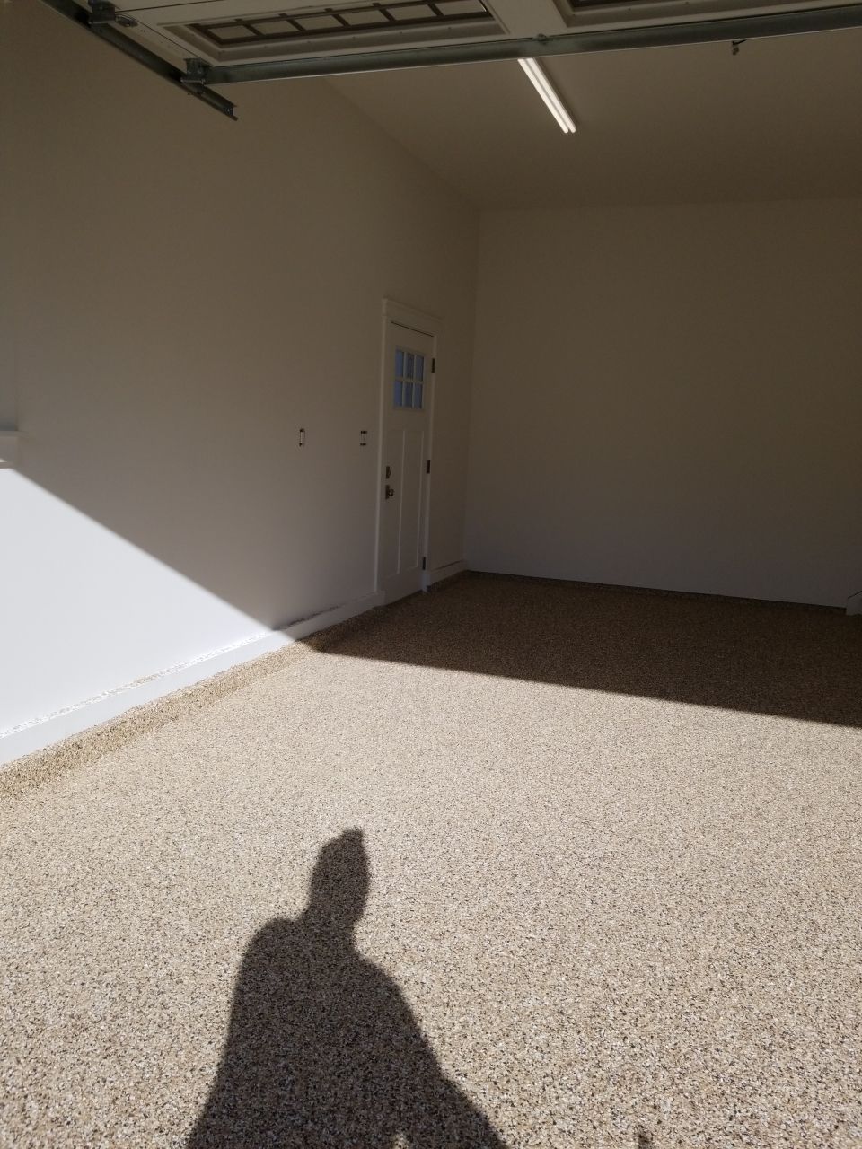 Garage Floor in Sandstone by Spectrum Painting, LLC