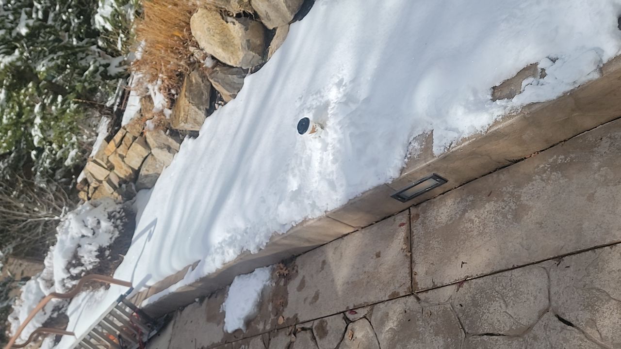Standing Seam Metal Roof Replacement After Snow Damage by ASAP Roofing & Restoration