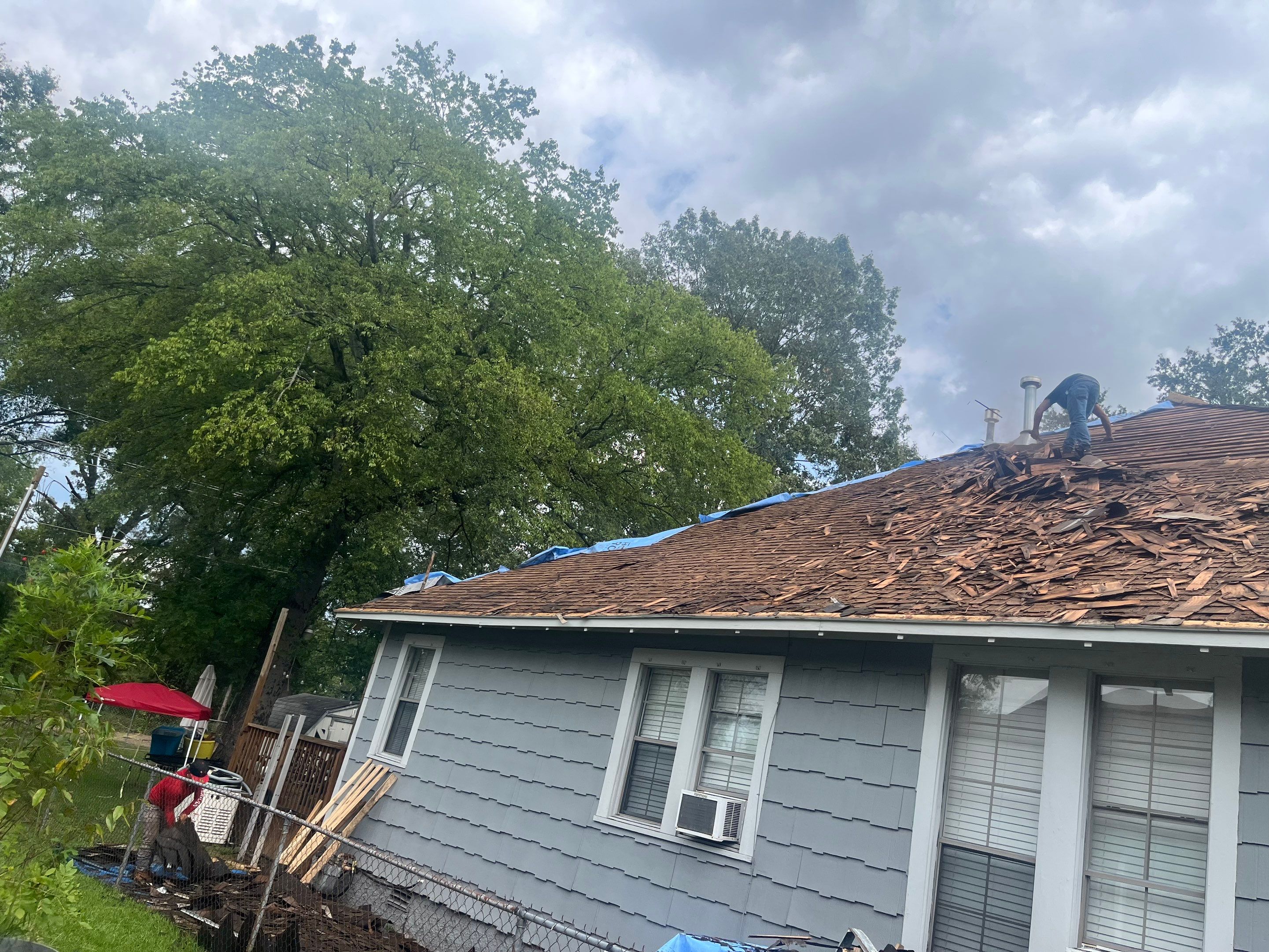 Residential Metal Roof Replacement using Reed's Metals: Colored Residental Panel (Burgundy) by Hostetler Roofing