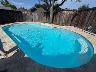 Freeform Pool Remodel with Travertine Deck