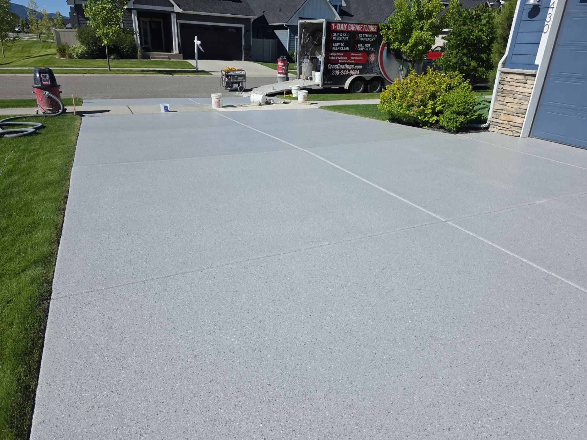 Battleship Hybrid Concrete Coating for Post Falls Patio and Driveway by Croc Coatings, LLC