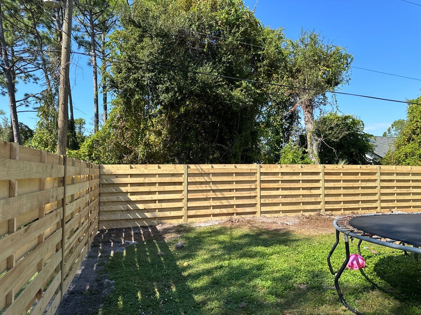 Wood Fence Installation using 6 Ft. Tall Pressure Treated Wood Shadowbox Fence by Asap fence and gates, LLC