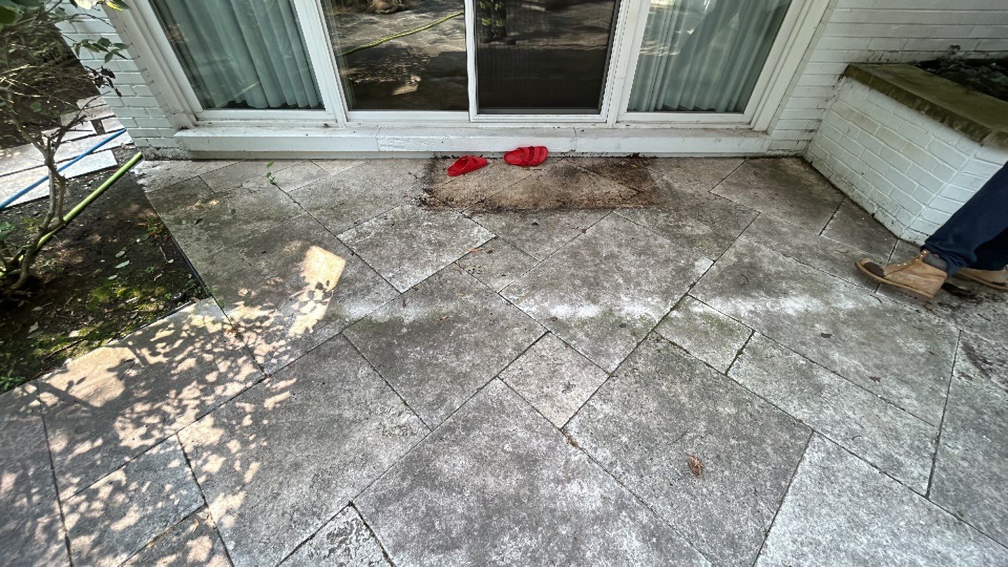 marble patio cleaning and sanding using Polysweep polymeric sand by Northern Power Washing LLC.