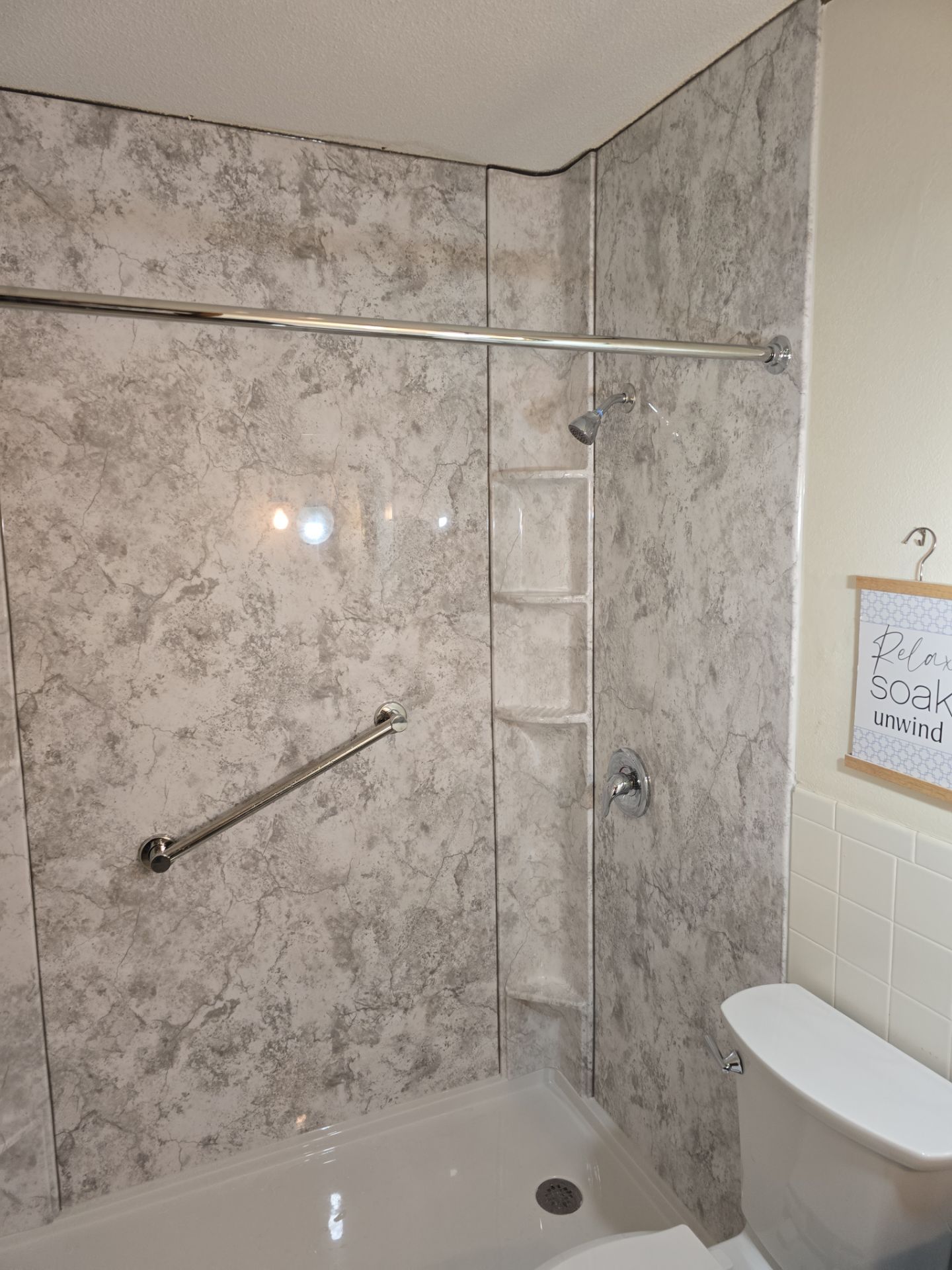 Tub to Shower , flooring, and countertop by The Shower Company