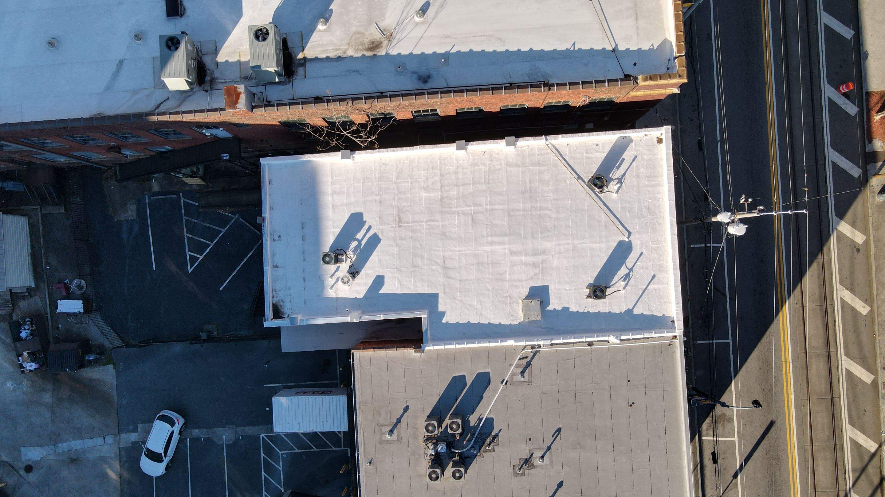 Commercial Roofing Coating using Everest Silicone Coating by Georgia Roof Advisors