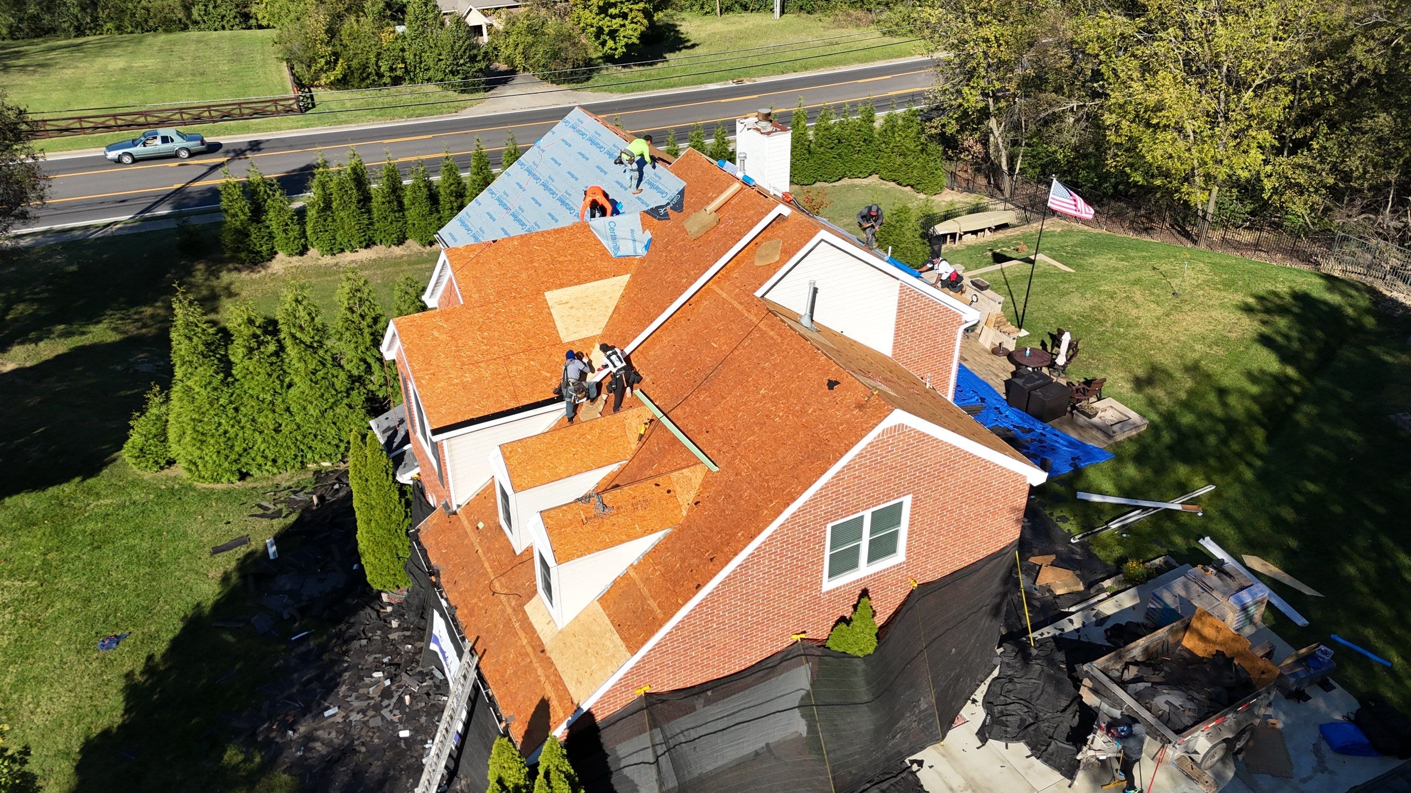 Charcoal Black Re-Roof & Gutters by Royal House LLC
