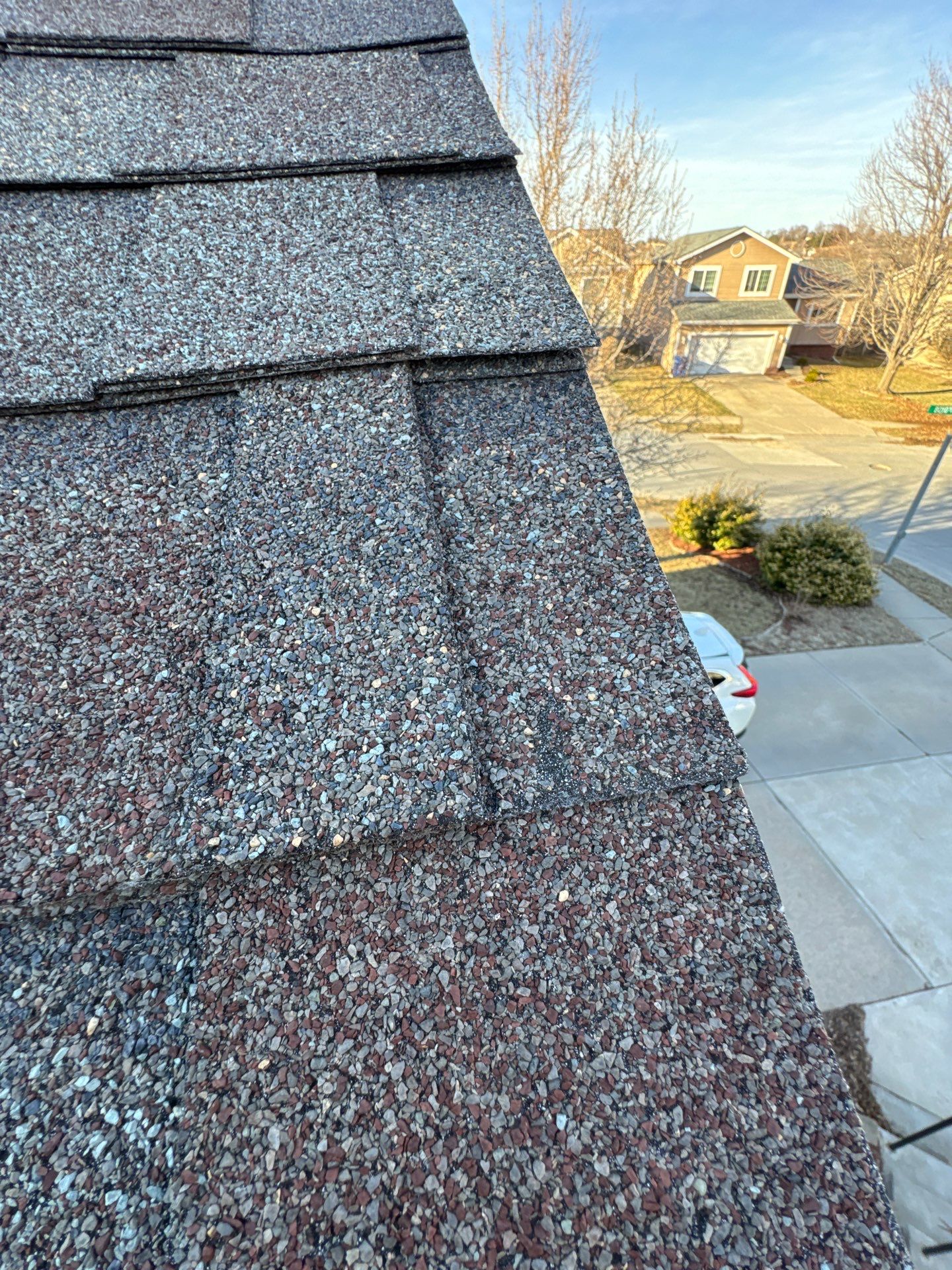 Storm Damage Inspection and Asphalt Shingle Roof Restoration in Omaha by Crows Roofing LLC