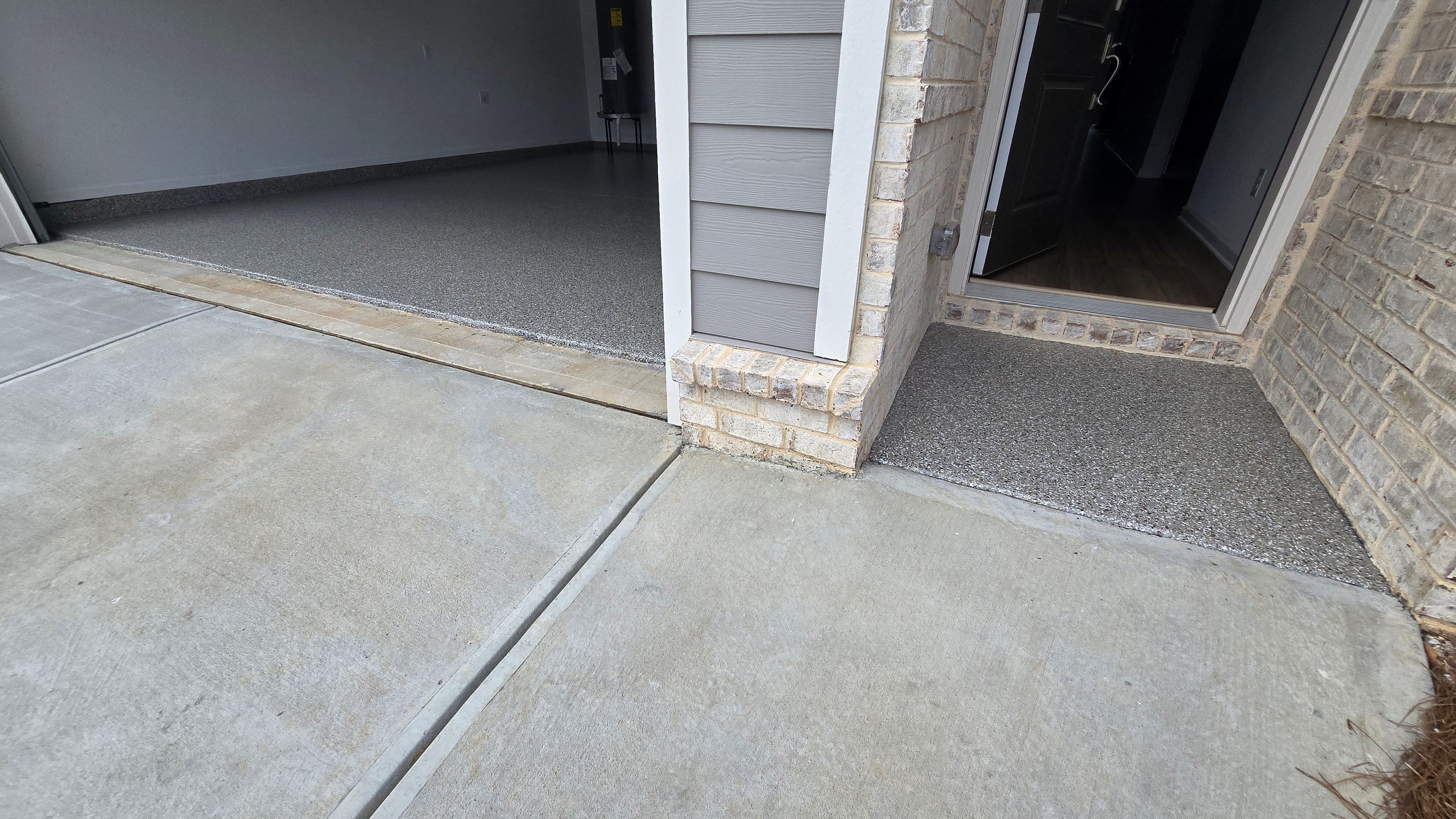 Garage Using Creekbed by Elite Floor Solutions