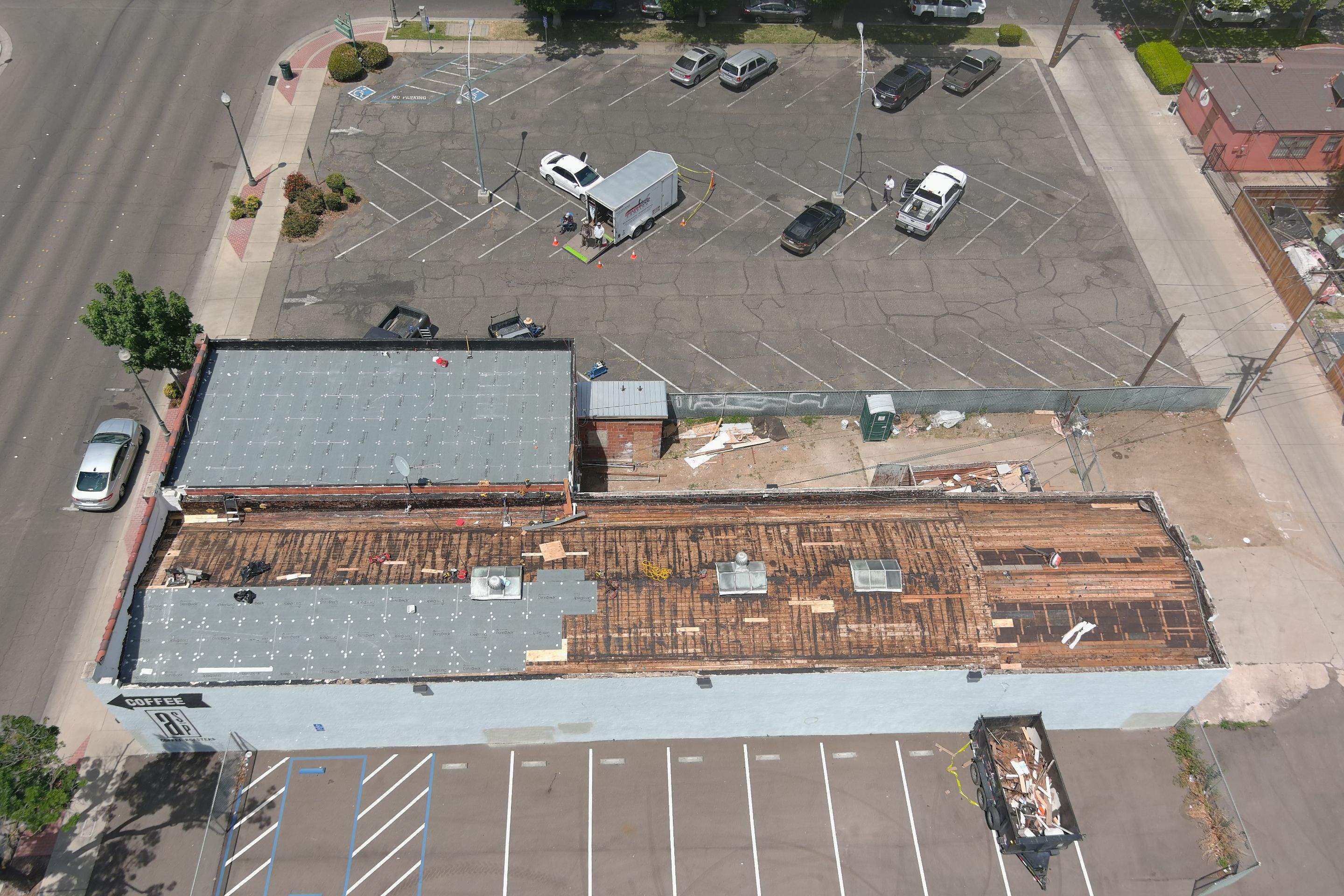 Commercial Roofing Installation using Conklin BenchPly system with PUMA top coat (imbedded fabric system) by Straight Edge Roofing Inc