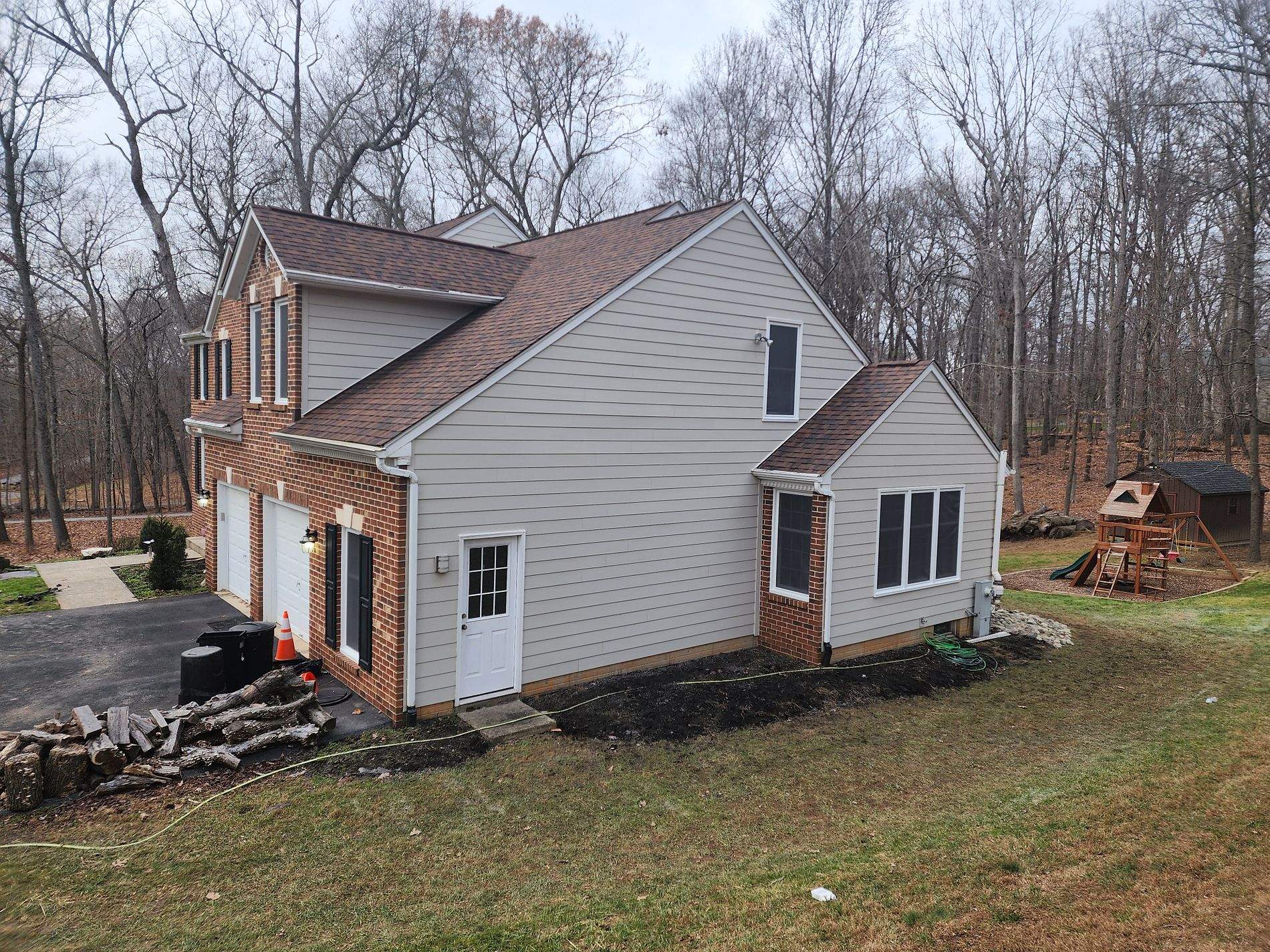 Siding Installation using James Hardie Siding- Cobblestone & Provia Signet Entry Door by Roof Right Inc