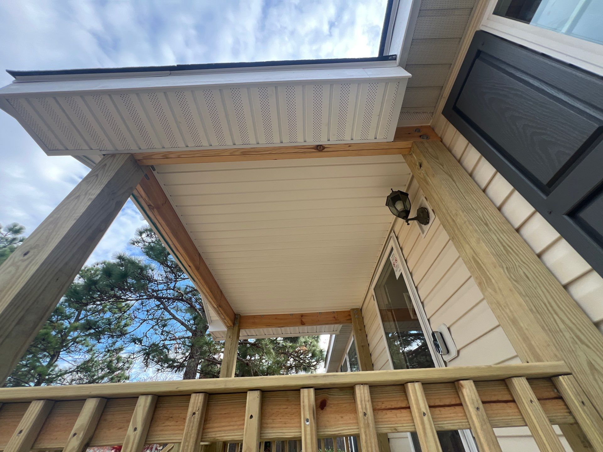 Full Roof Replacement and Custom Front Porch Addition in Pinebluff by The Remodeling Company