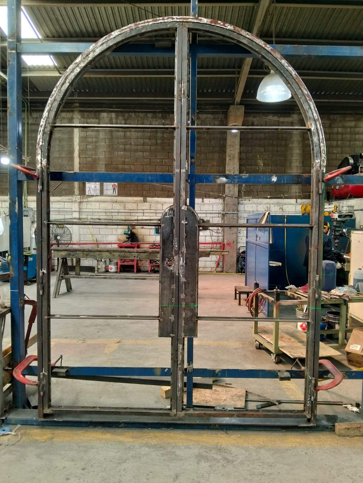 Custom Arched Metal Entry Door Installation in Plano by Solara Custom Living