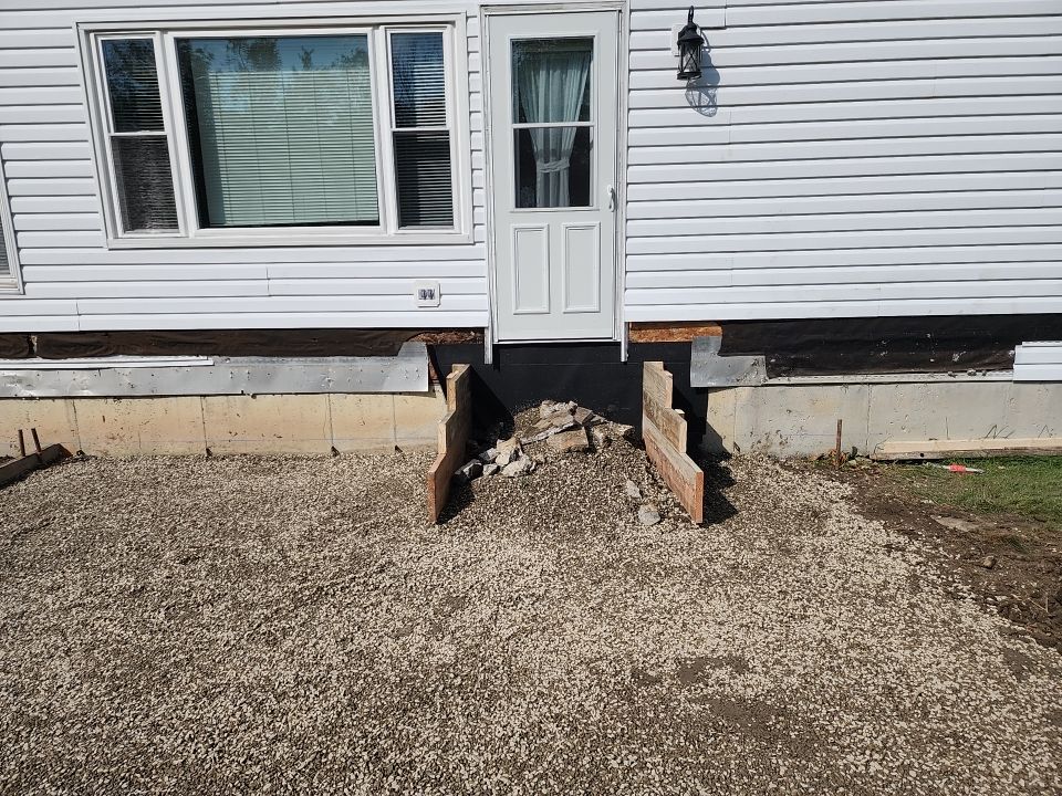 Stamped Concrete and Entry Door by Ivy Lea Construction