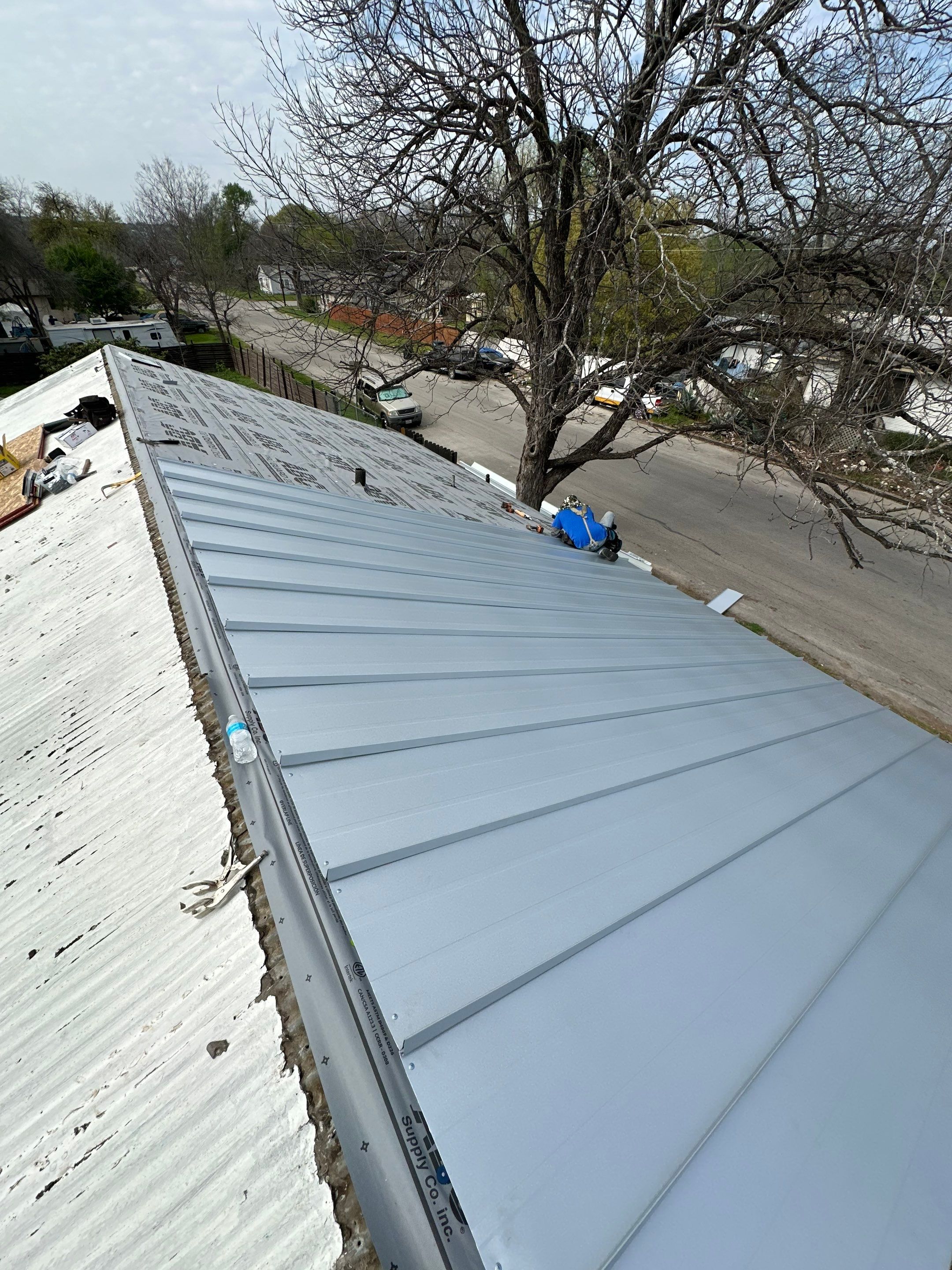 Residential Metal Roof Installation using McElroy Metal by Premier Roofing and Contracting