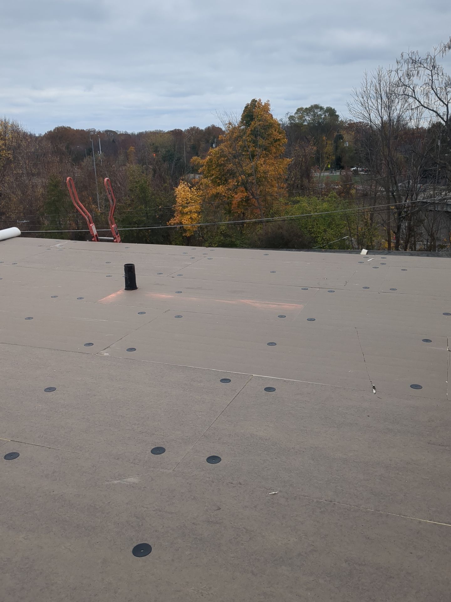 Commercial Roofing Installation using Duro-Last 50 mil PVC by 3 Daughters Construction 