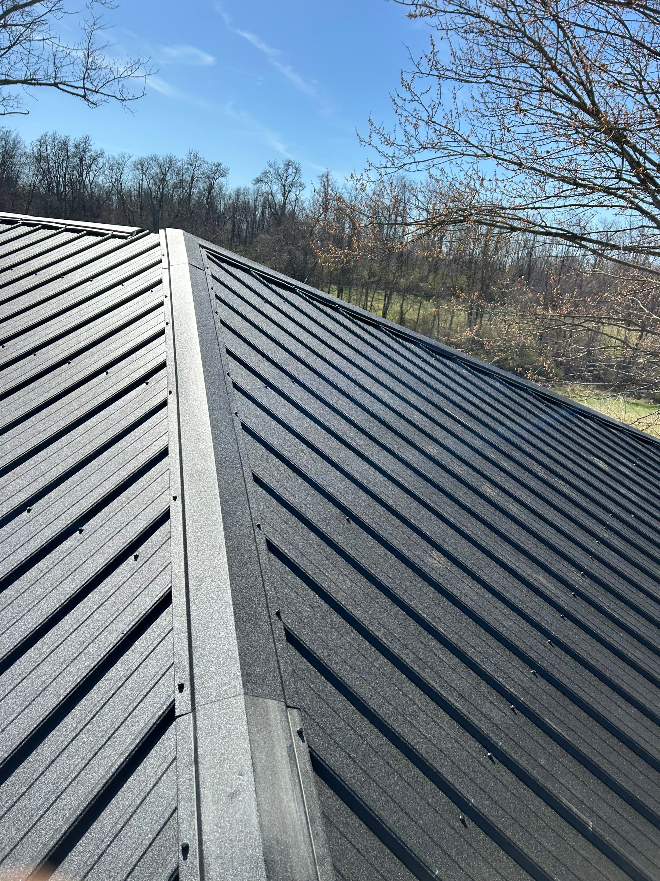 Commercial Roofing Installation using Performance Panel Metal - Frost Black by RoofX 