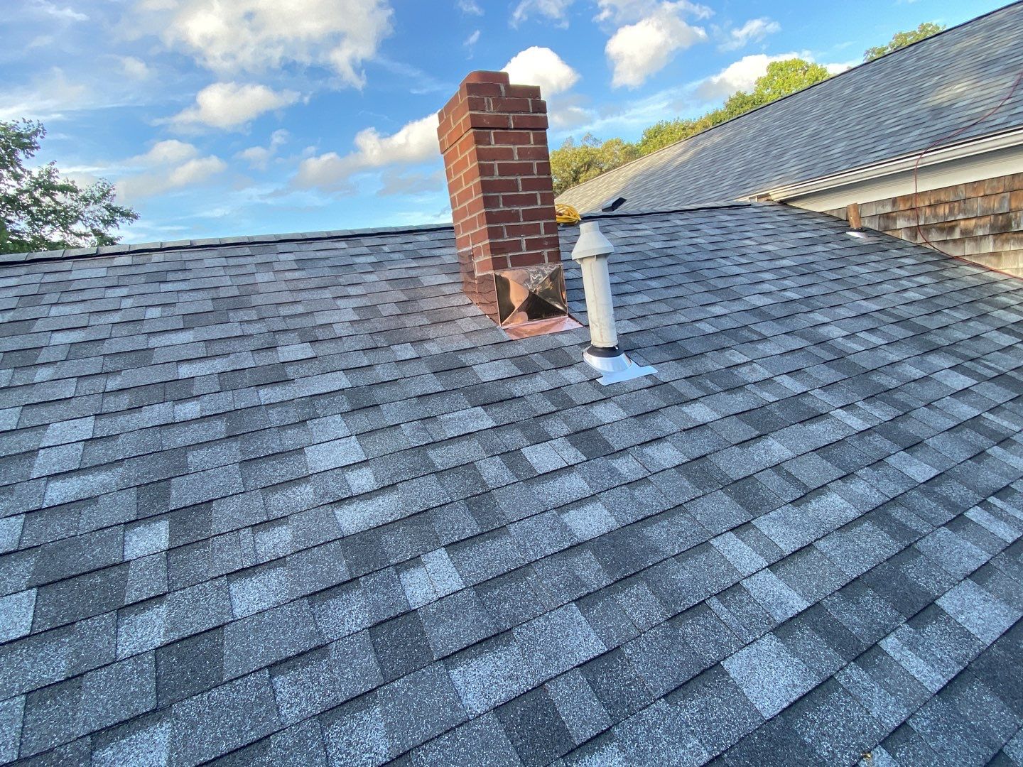Residential Roofing Installation using Owens Corning Duration Slatestone Gray by A Plus Exterior