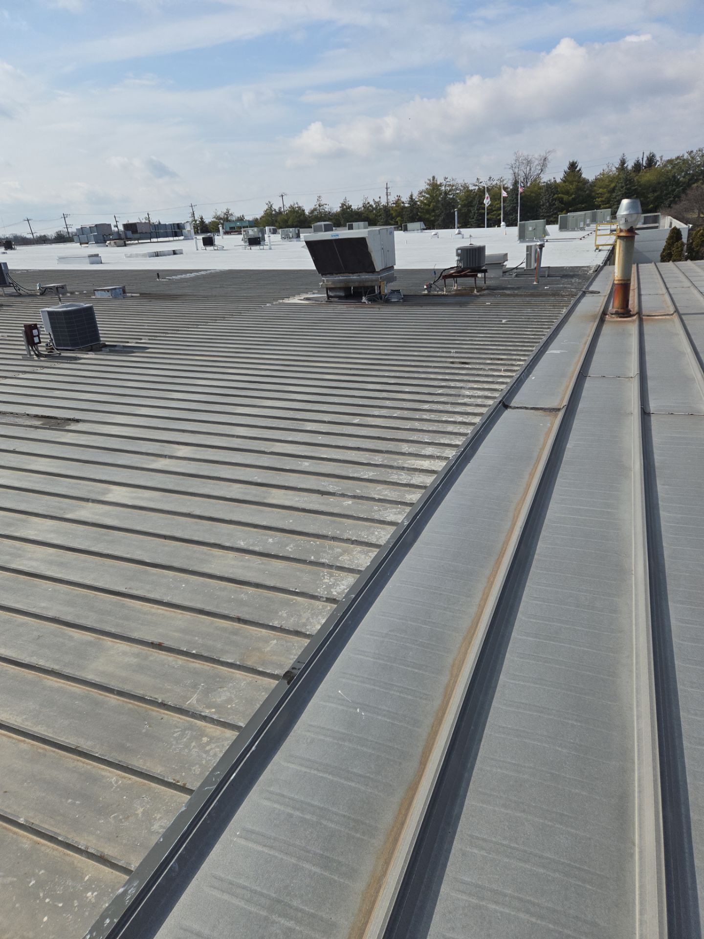 Commercial Metal and Flat Roof Repairs in Mason, Ohio by Level Up Roofing and Restoration Services LLC