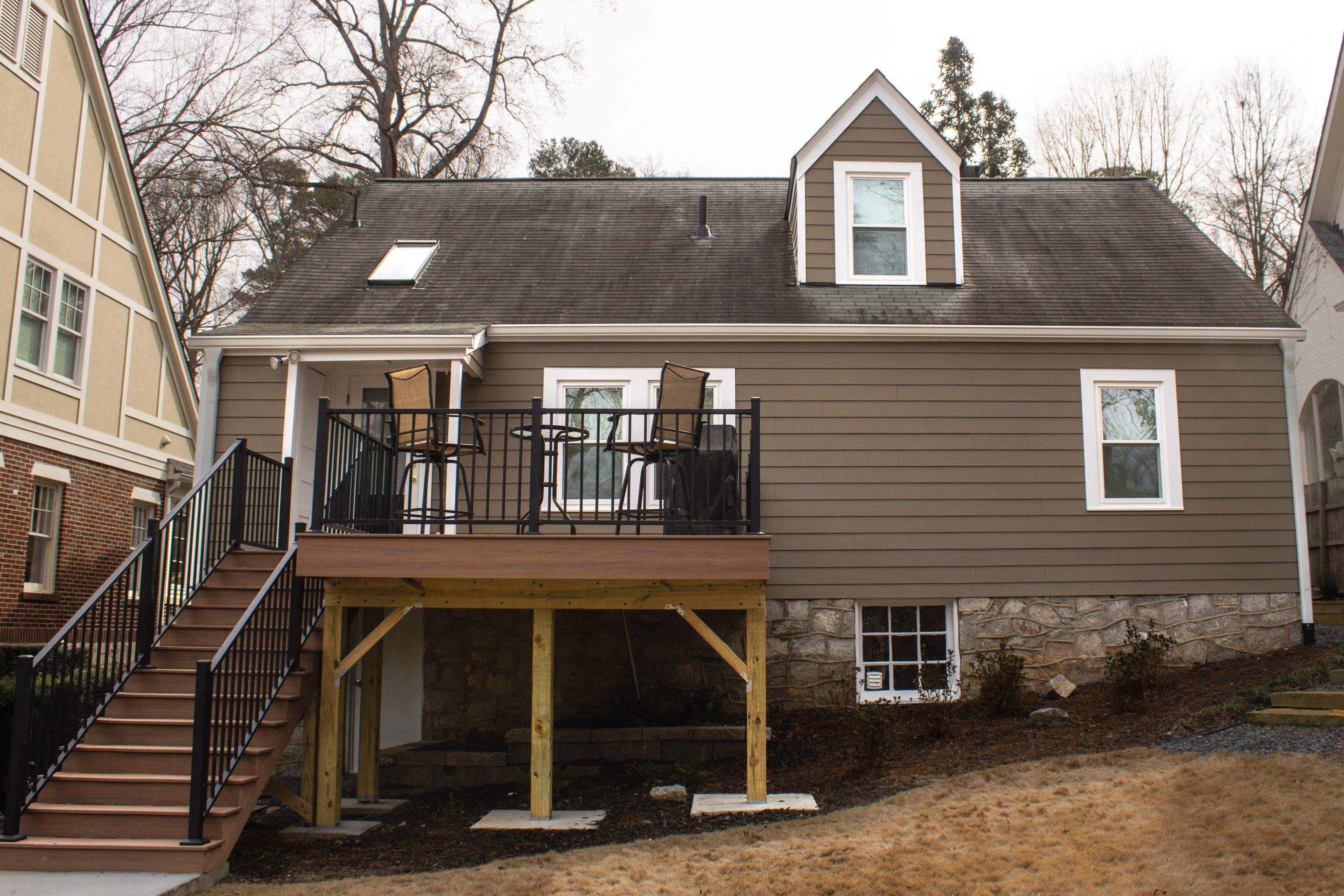 Full Siding Replacement, Deck Build, Exterior Paint, and Gutter Replacement  by Nelson Exteriors 