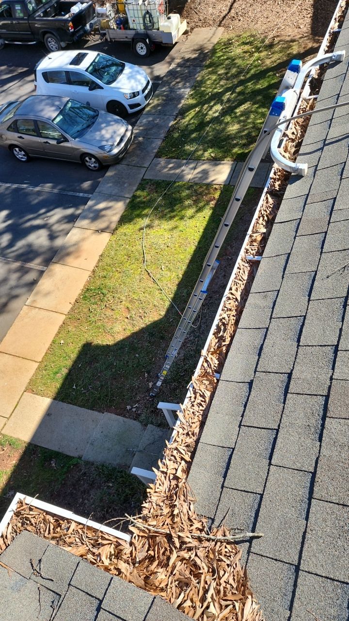 Gutter Cleaning using water by Power Wash Masters LLC