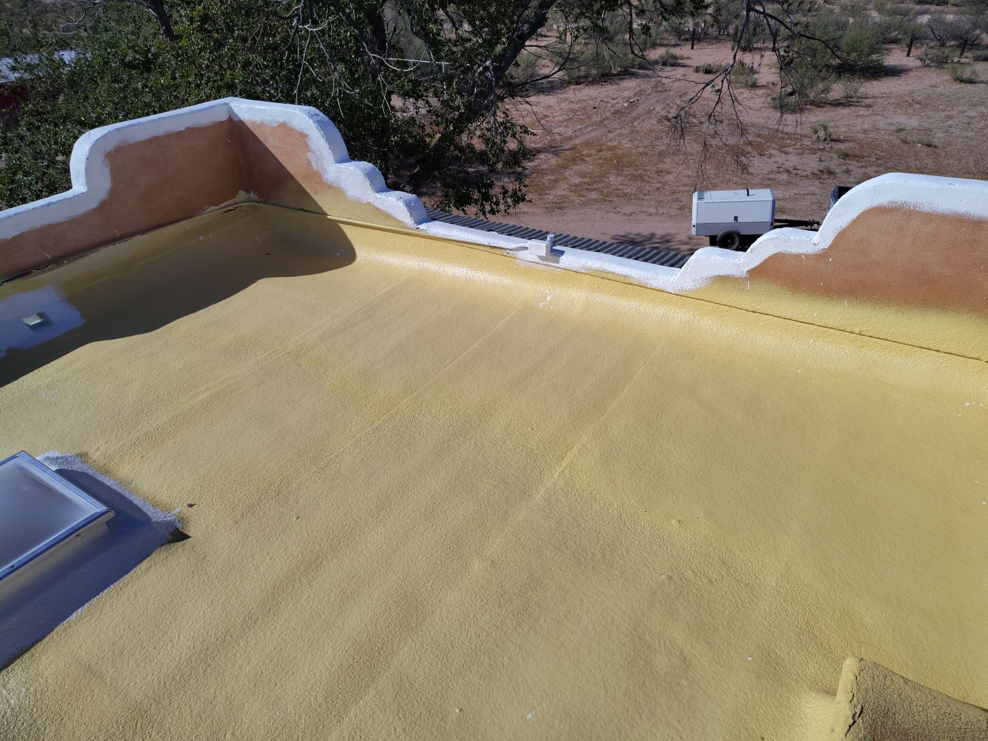Residential roof application by SPF Services 