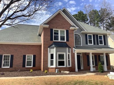 Comprehensive Exterior Renovation Featuring James Hardie Siding in Suwanee