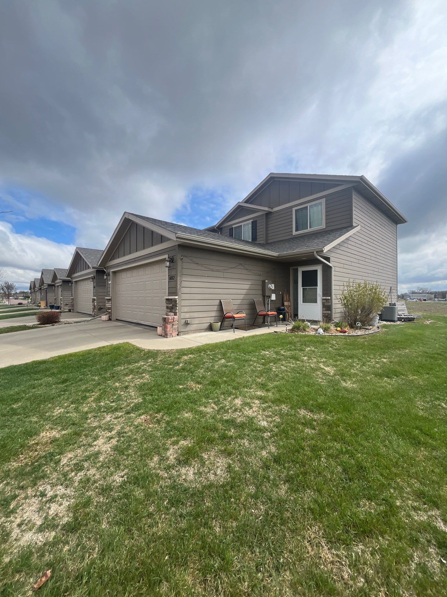 Exterior Painting for Multi-Unit Townhomes in Sioux Falls by Select Painting, Coatings & Garage Cabinets