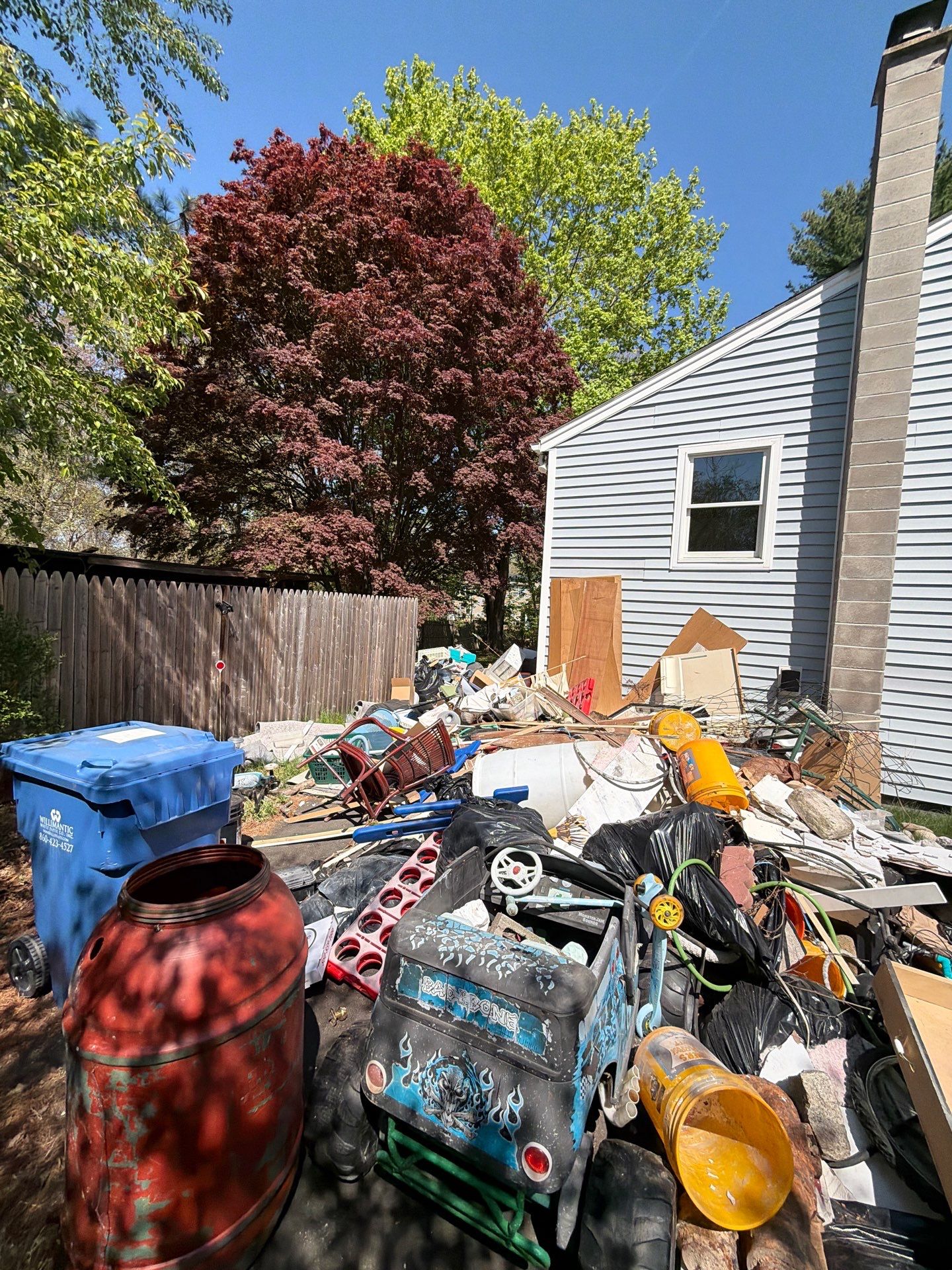 Full Property Cleanout at a Split-Level Home in Montville, CT by Diamond Image LLC