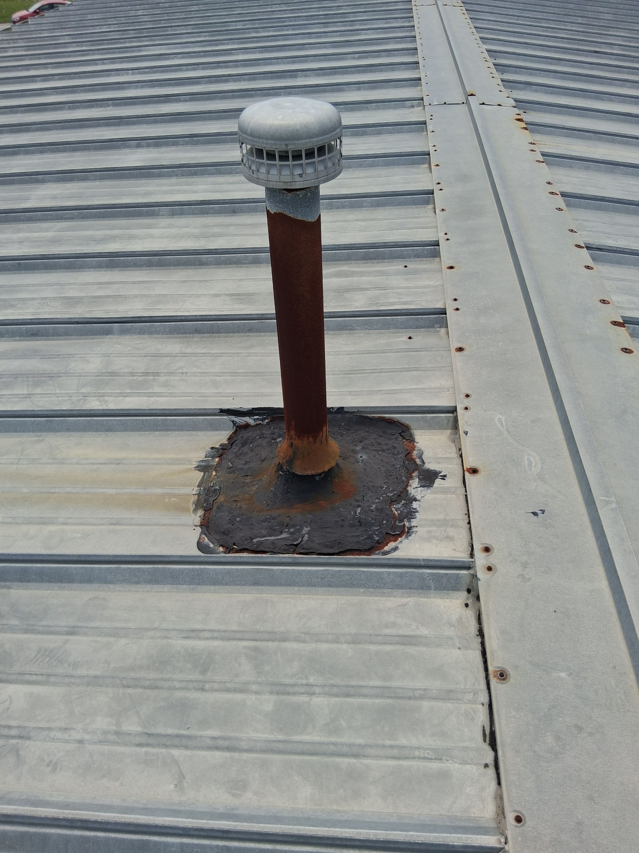 Commercial Metal Roof Vent Repair in Wilmington, NC by RGR Construction and Roofing, LLC
