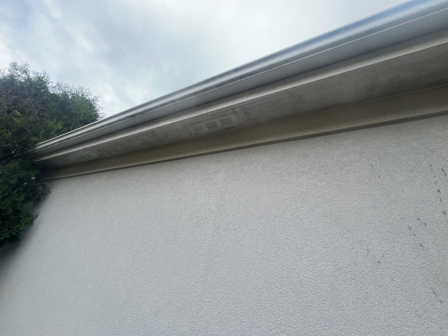 dryvit using Algaecide, soft wash soap by Northern Power Washing LLC.