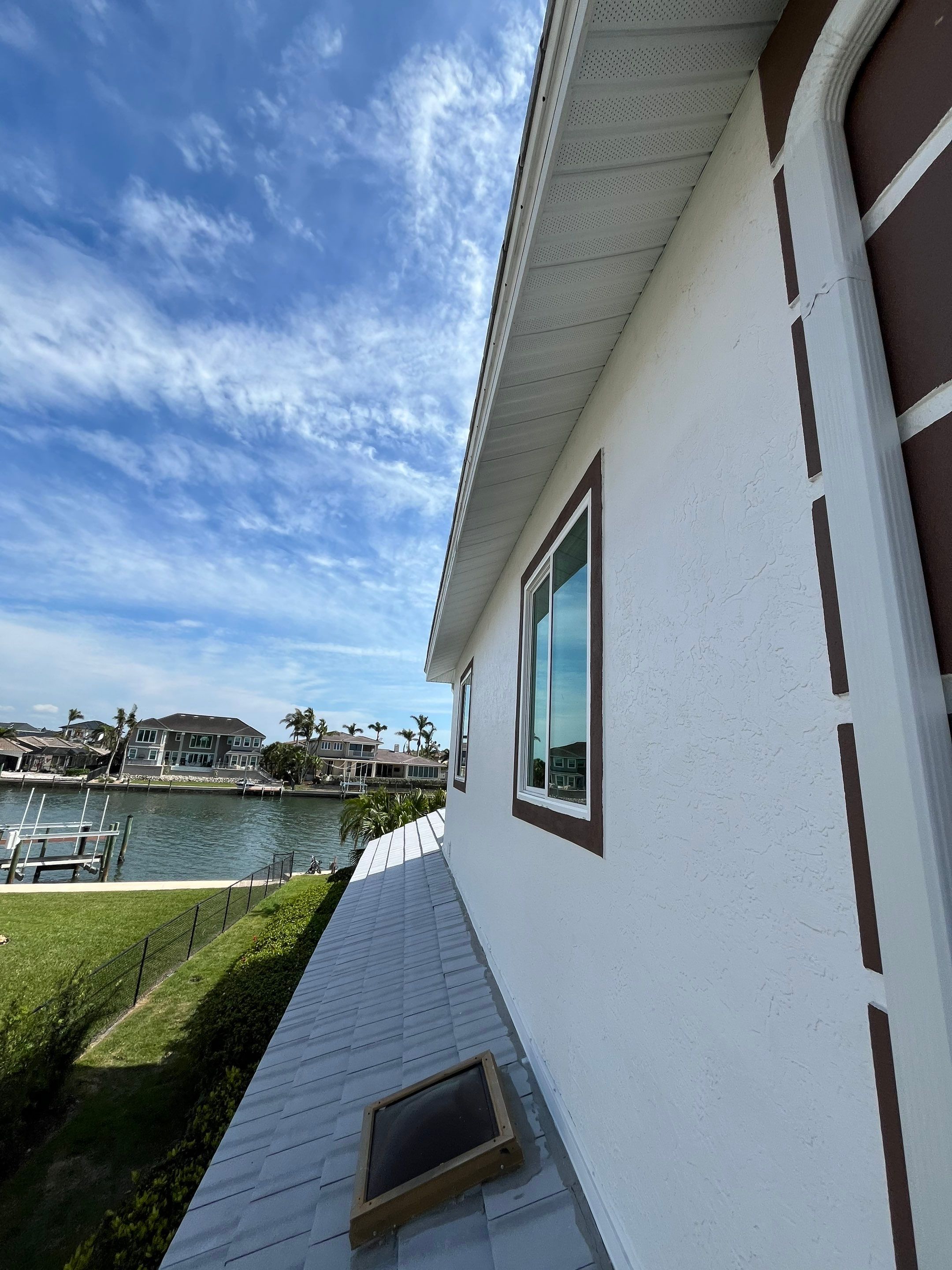Repainting and Upgrading Gutters in Sarasota FL by Gutter Professors