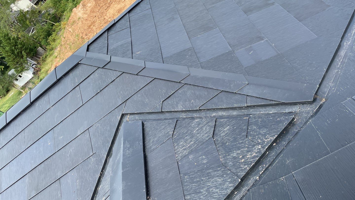 Tesla Solar Roof  using Tesla Solar Roof V3 tiles by American Home Contractors