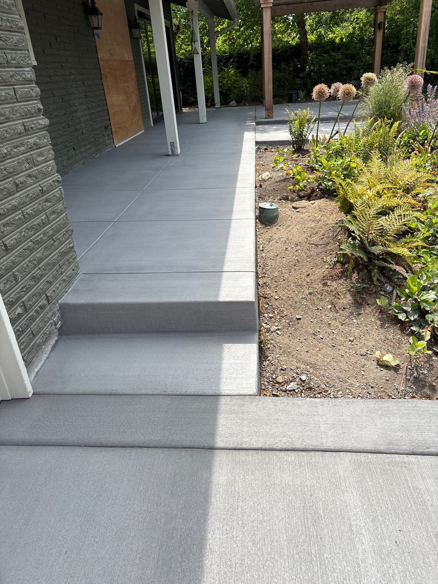 Concrete Driveway Makeover | Edmonds  by Jireh Asphalt & Concrete Inc 