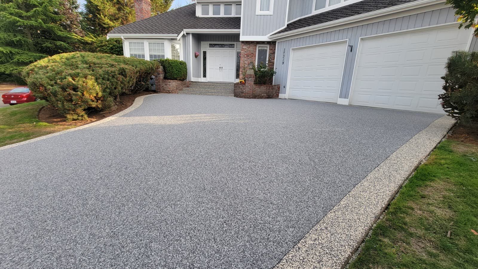 Elegant Driveway and Patio in Palazzo Vuba Stone by Concrete Coating Experts Inc.