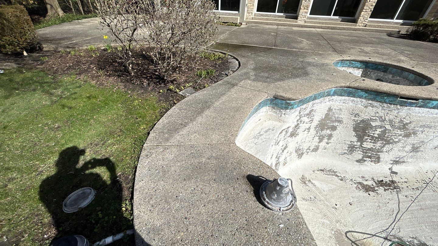 Aggregate Clean and seal using low gloss sealer by Northern Power Washing LLC.