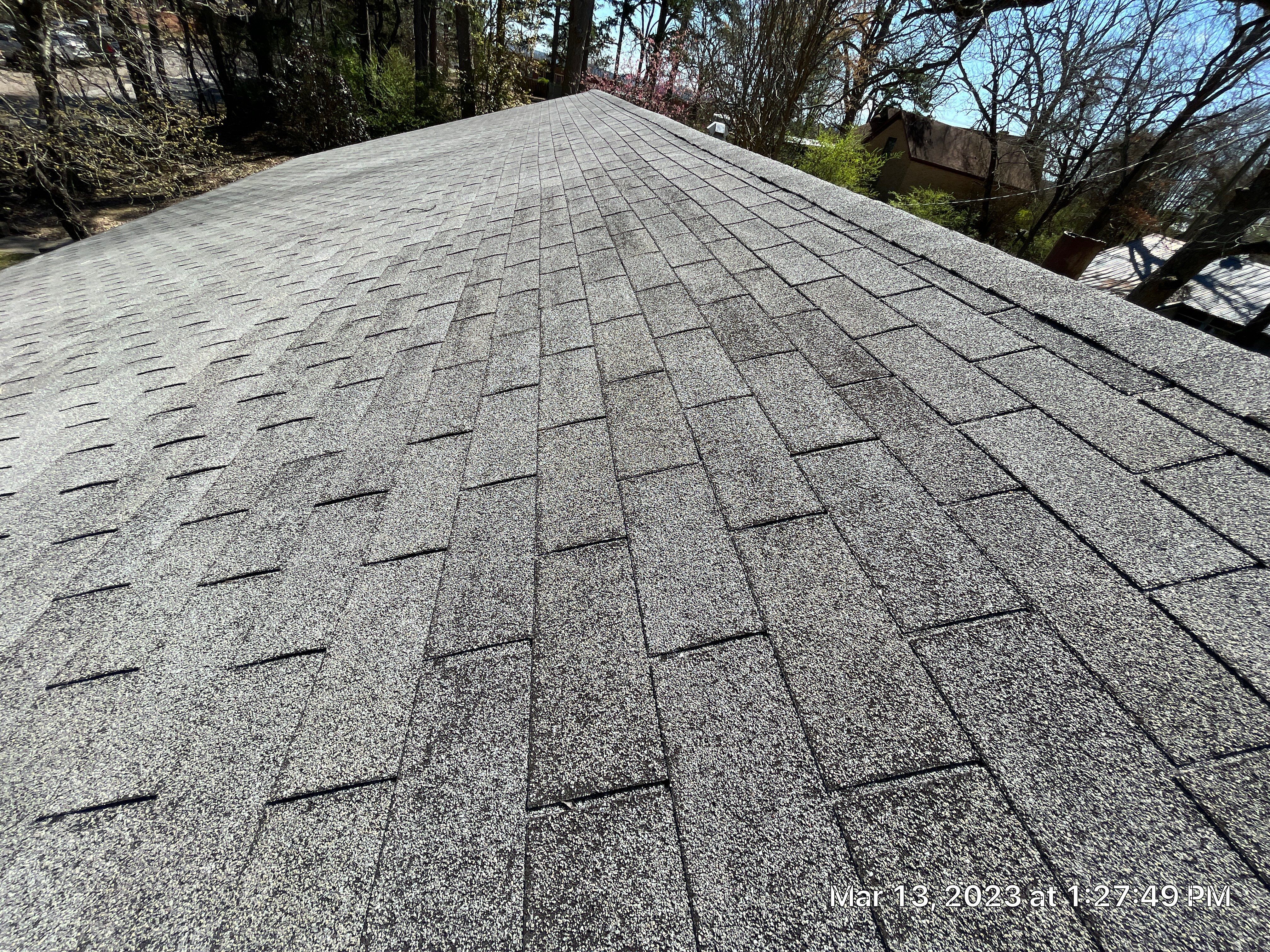 Residential Roofing Installation using 26 Gauge Colored Panels by Hostetler Roofing